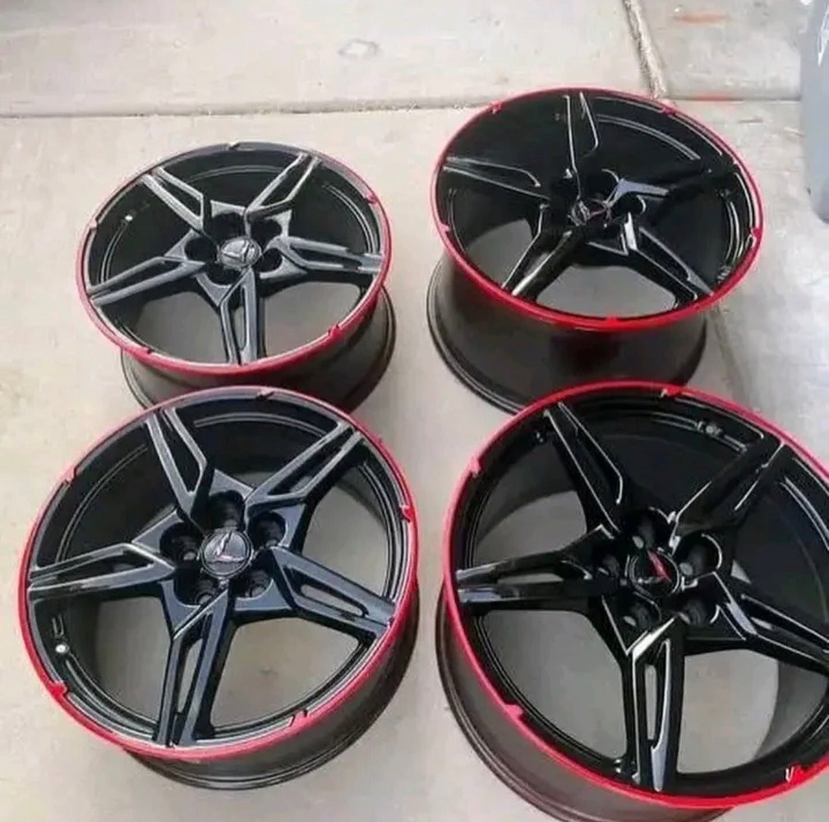 wheels gloss black and torch red custom trim.
