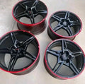 wheels gloss black and torch red custom trim.