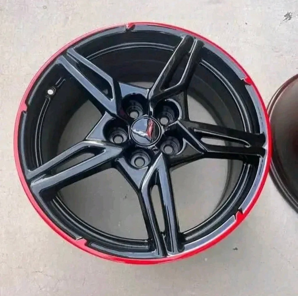 wheels gloss black and torch red custom trim.