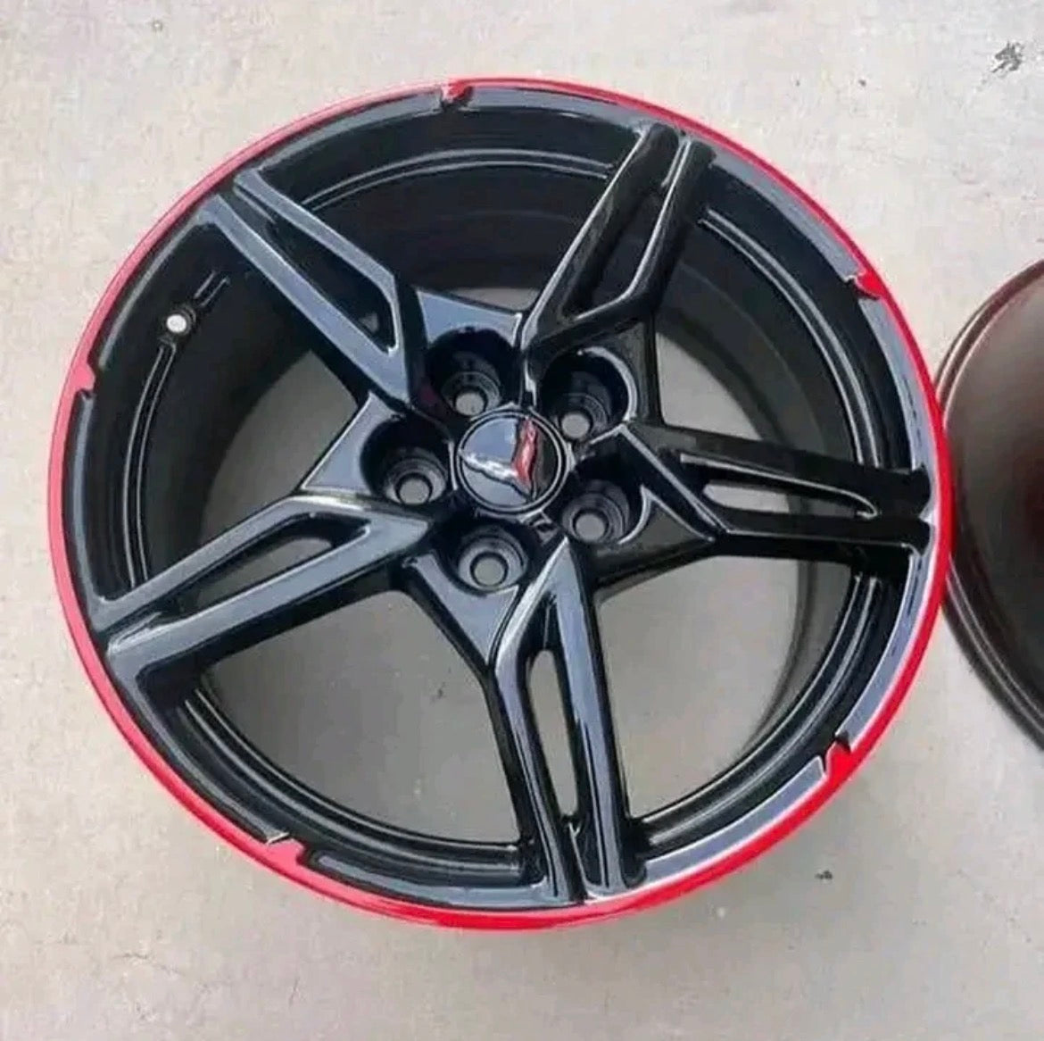 wheels gloss black and torch red custom trim.