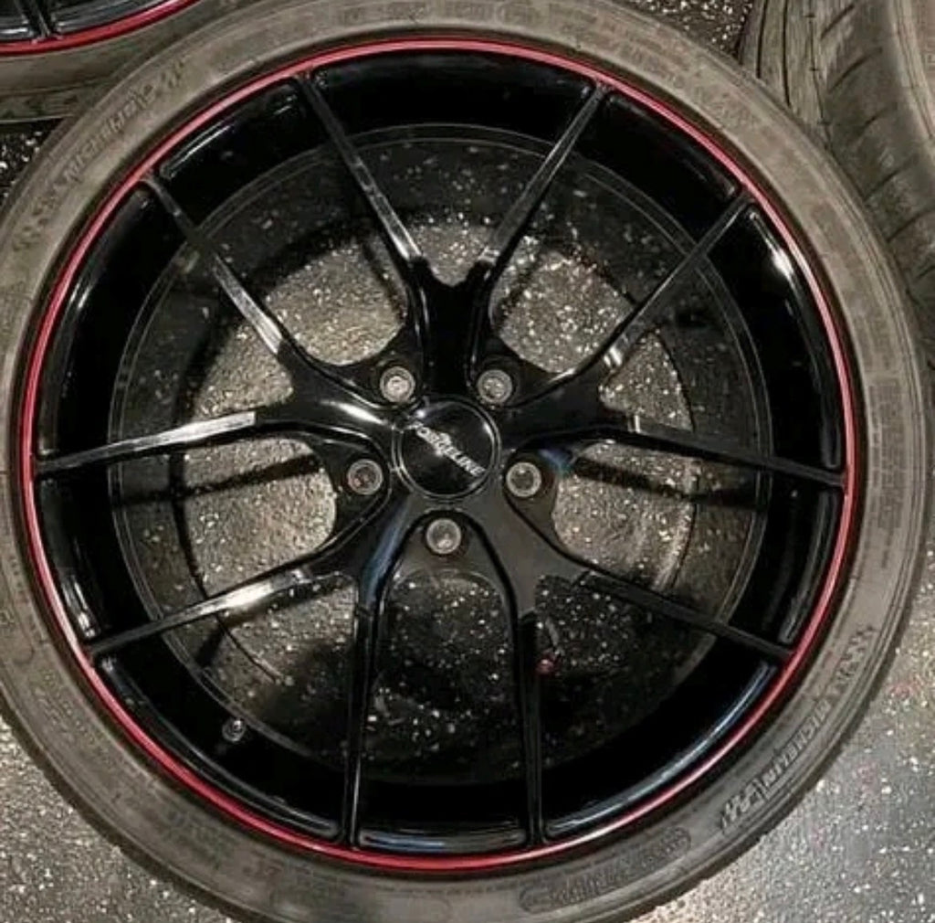 wheels gloss black and torch red custom trim.